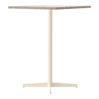 Square table with a light wood grain top and a cream-colored metal base, featuring a minimalist design.