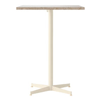 Cream-colored metal base with a textured beige top, perfect for modern decor.