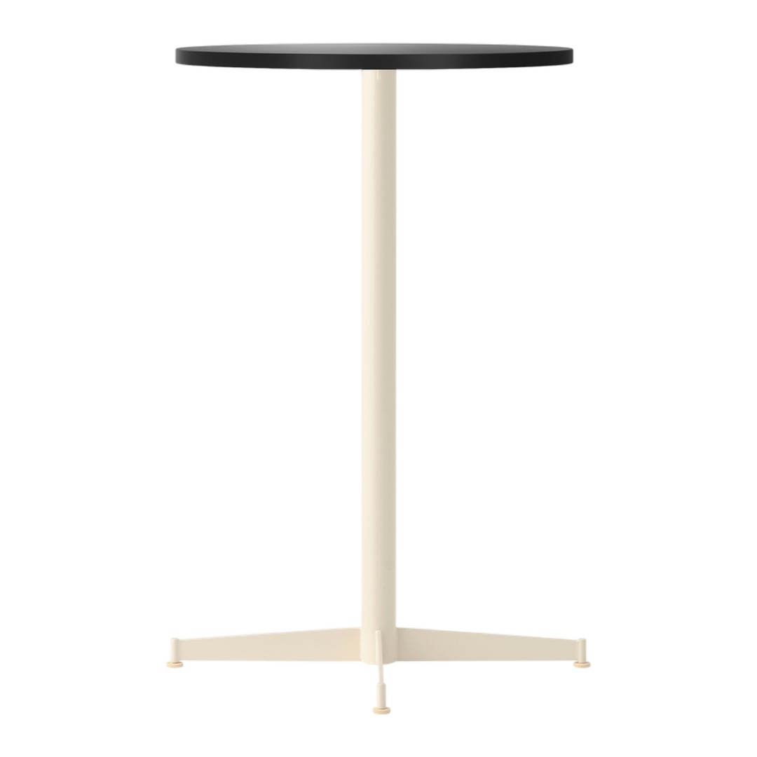 Minimalist round table with a black top and cream-colored base, featuring a sleek, modern design.