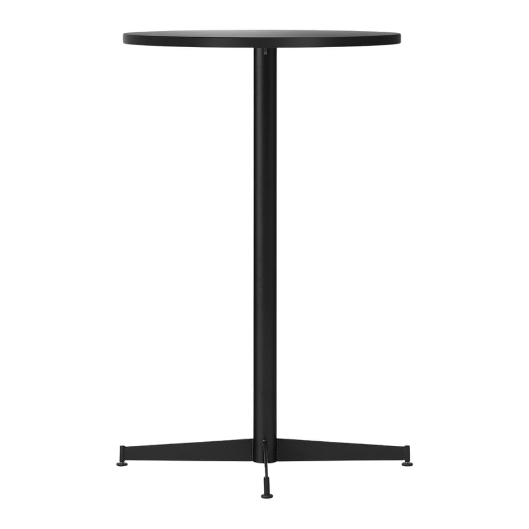 Black round table with a sleek, minimalistic design and a smooth surface. Ideal for modern interiors.