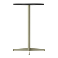 Round black tabletop with a sleek olive green metal base, minimalistic design perfect for modern spaces.