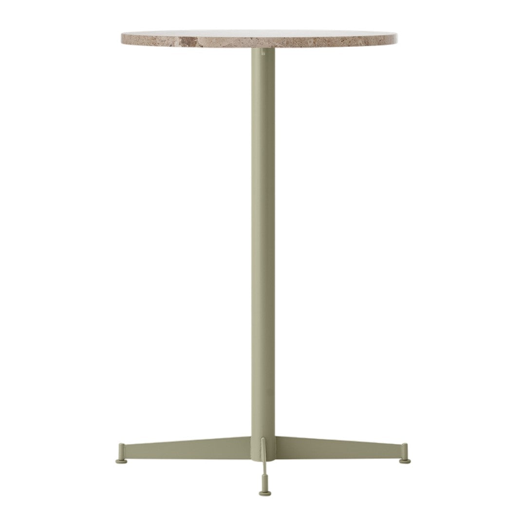 Round tabletop in light beige with a sleek green metal base, perfect for modern decor.