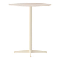 Cream-colored round table with a smooth wooden top and a minimalist metal base in a soft off-white hue.