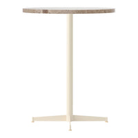 Round table with a light beige top and a cream-colored metal base, featuring a smooth, modern design.