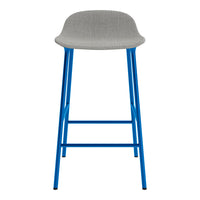 Gray upholstered bar stool with vibrant blue metal legs. Modern design and sleek lines. Ideal for contemporary spaces.