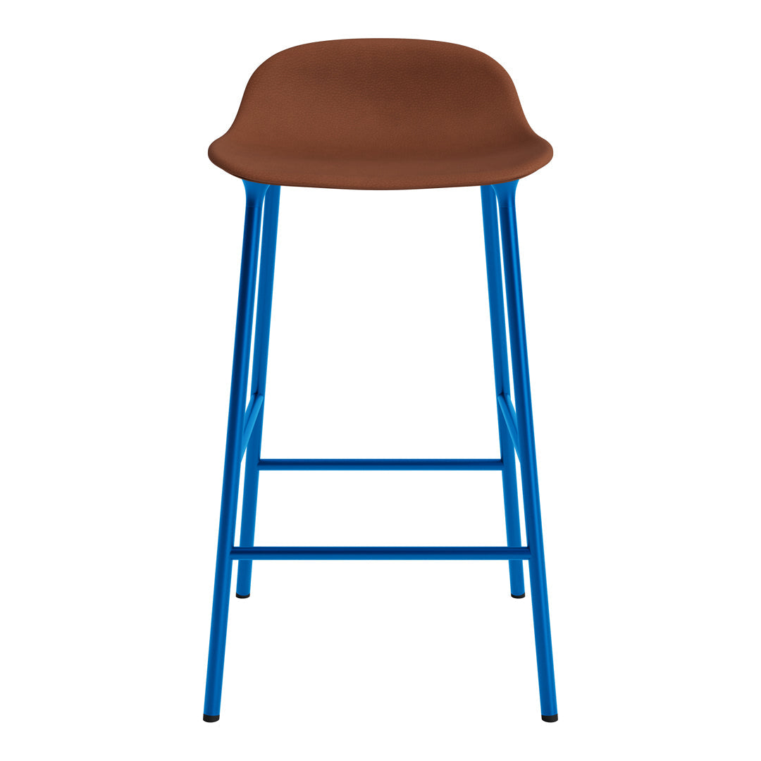Brown seat with blue metal legs, featuring a sleek and modern design. Ideal for contemporary decor.