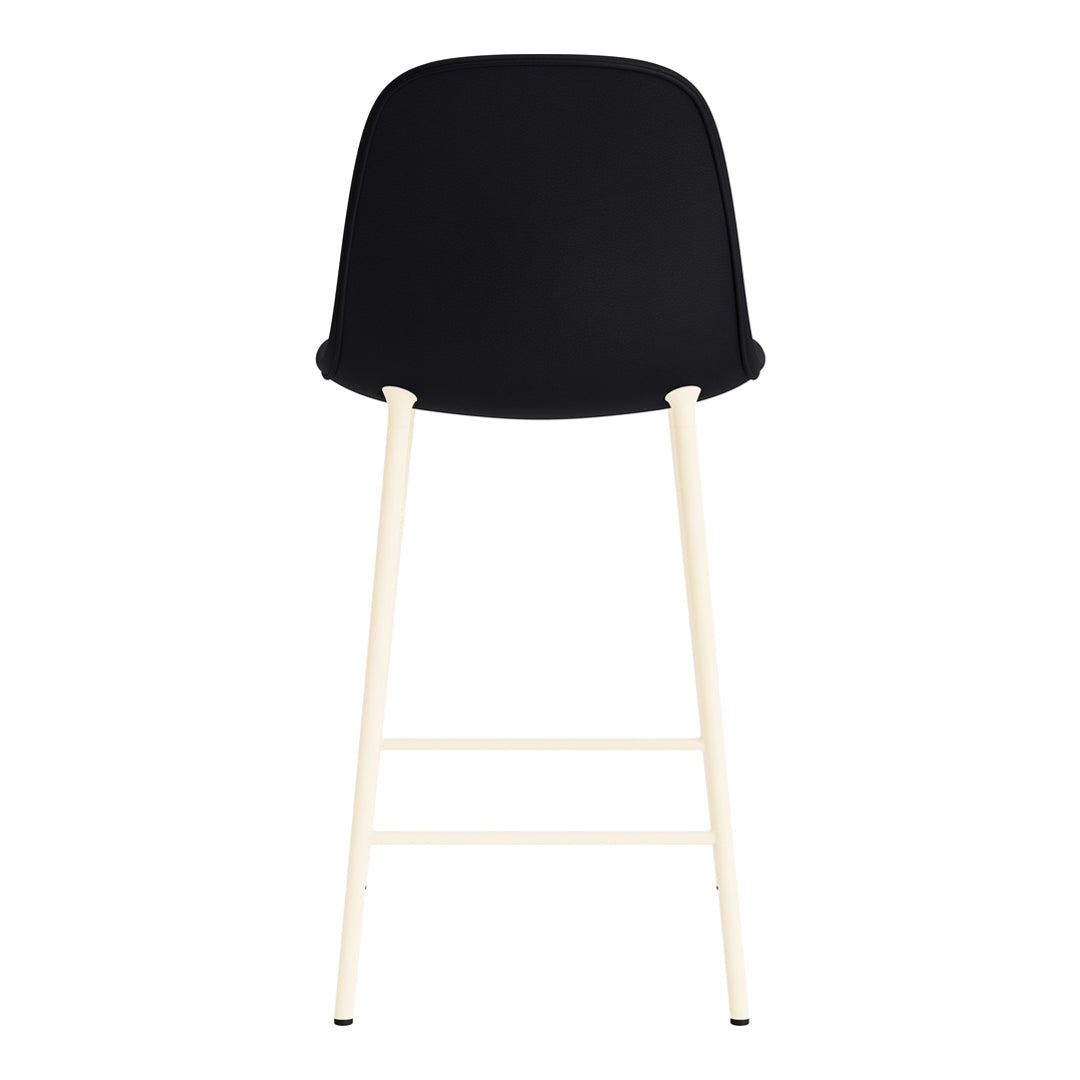 Black upholstered bar stool with light cream-colored legs, showcasing a modern, minimalist design.