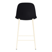 Black upholstered bar stool with light cream-colored legs, showcasing a modern, minimalist design.