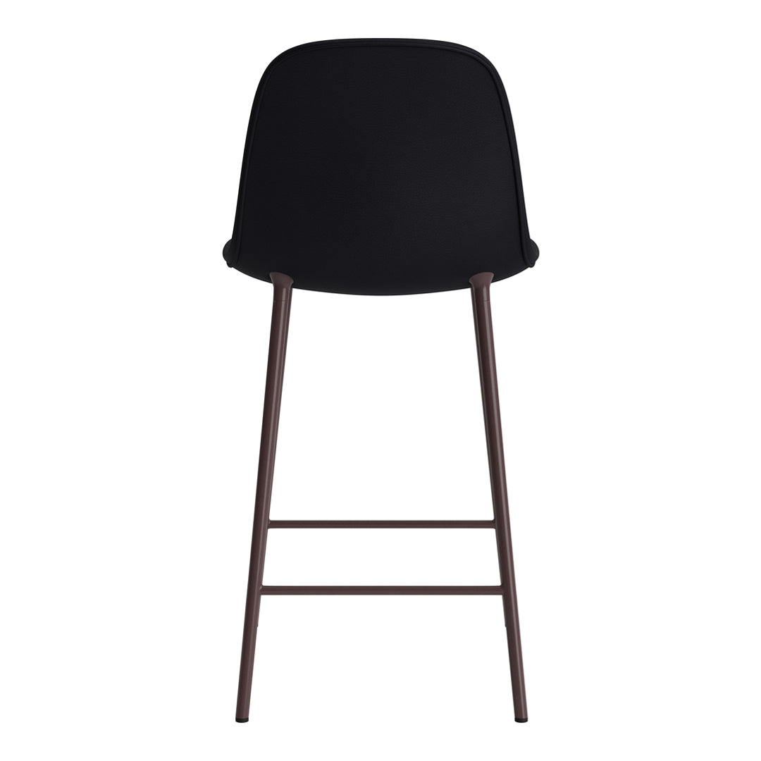 Black upholstered bar stool with sleek lines and dark wooden legs. Modern design, perfect for any contemporary space.