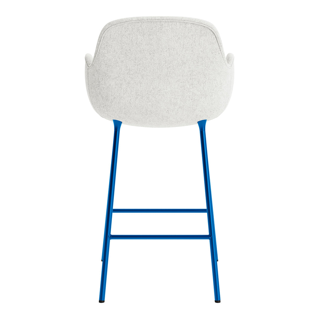 Back view of a chair with a light gray upholstered seat and vibrant blue metal legs. Modern design in neutral colors.