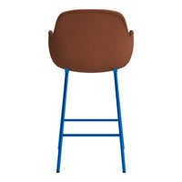 Brown upholstered chair with a sleek blue metal frame, perfect for modern decor.