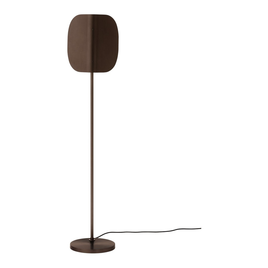 Brown metal floor lamp with a unique oval shade and sleek minimalist design. Perfect for modern interiors.