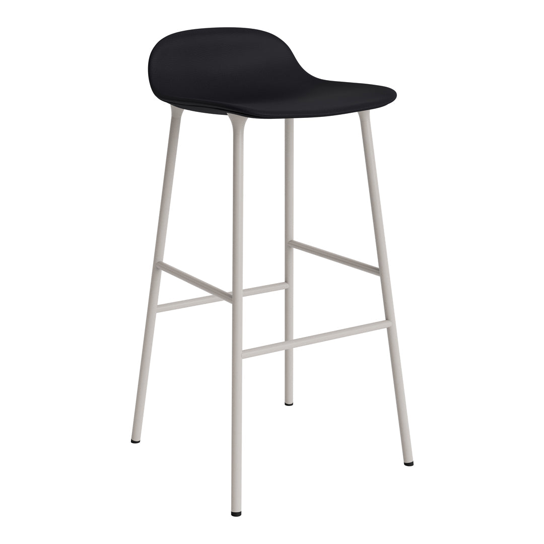 Black bar stool with a smooth, minimalist design and sleek silver legs, perfect for modern interiors.