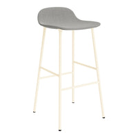 Gray upholstered bar stool with a minimalist cream-colored metal frame. Simple and modern design.