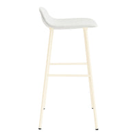 Light gray upholstered bar stool with a minimalist design and creamy white wooden legs. Ideal for contemporary decor.