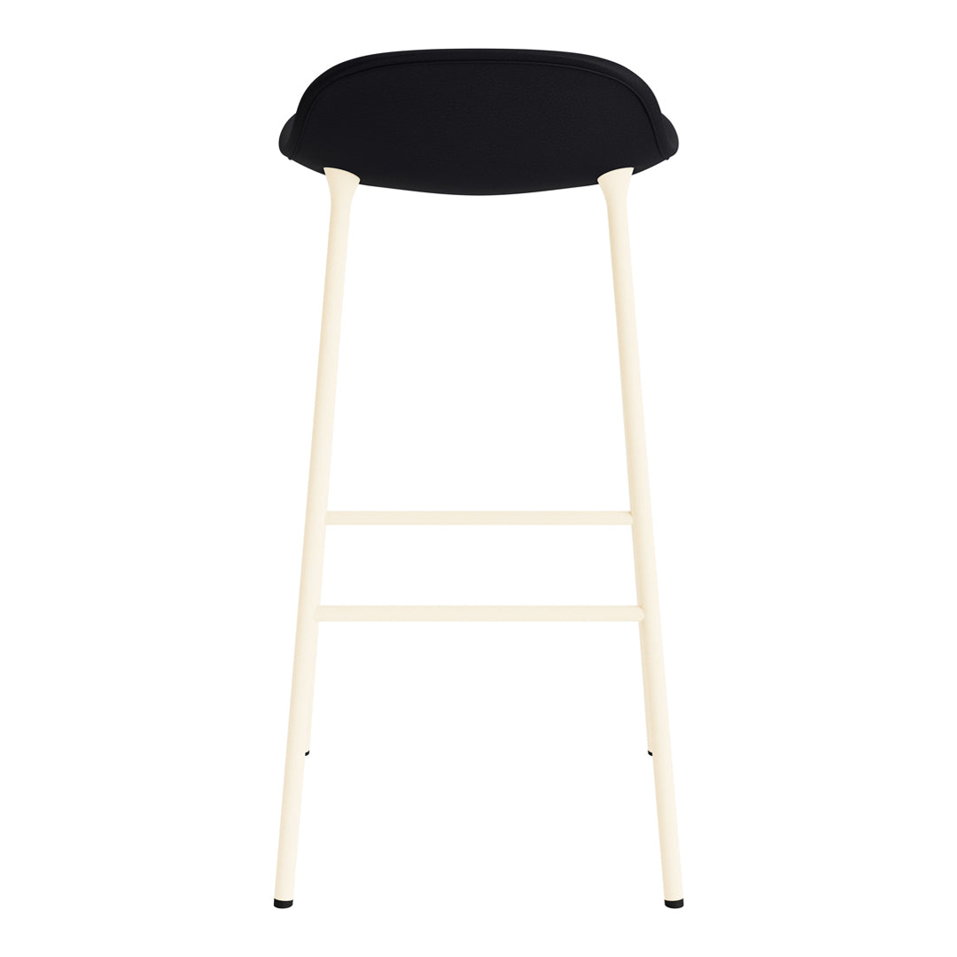 Black seat with cream-colored legs, minimalist design, no visible patterns. Ideal for modern decor.