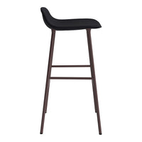 Black upholstered bar stool with a sleek, smooth finish and dark wood legs. Modern, minimalist design.