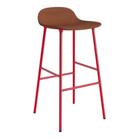 Brown padded seat with red metal legs; modern bar stool design, perfect for vibrant decor.