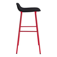 Black upholstered bar stool with sleek red metal legs, modern design, perfect for contemporary spaces.