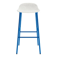 White upholstered bar stool with a vibrant blue metal frame. Stylish and modern design ideal for any décor.