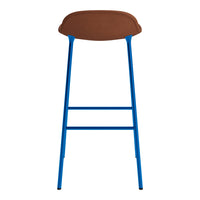 Brown cushioned seat with vibrant blue metal legs and minimalist design. Perfect for modern decor.