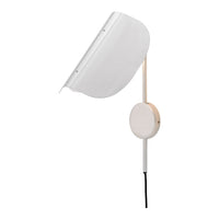 White modern wall lamp with a sleek design and minimalistic pattern, featuring a round mount and cord.