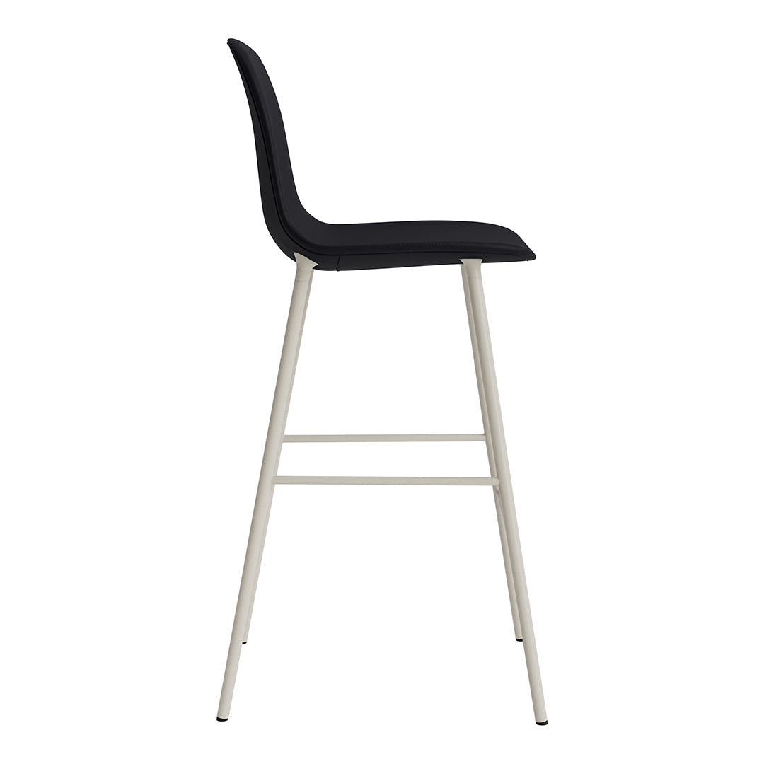 Black upholstered bar stool with sleek silver legs, featuring a minimalist design and smooth contours.
