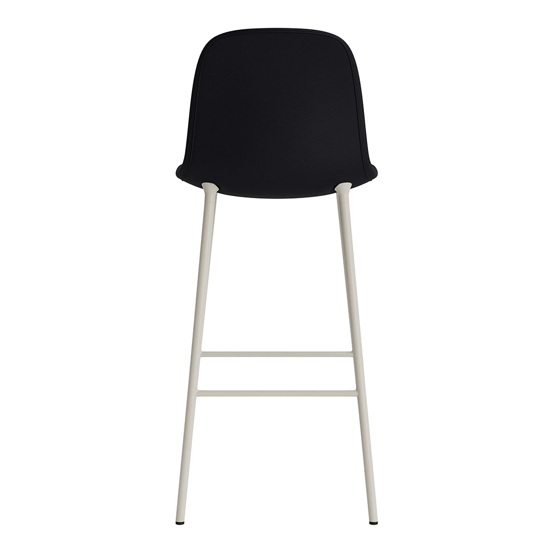 Black bar stool with a sleek design and light gray metal legs, showcasing a minimalist modern aesthetic.