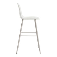 White minimalist bar stool with sleek silver metal legs and a smooth, clean design. Perfect for modern spaces.