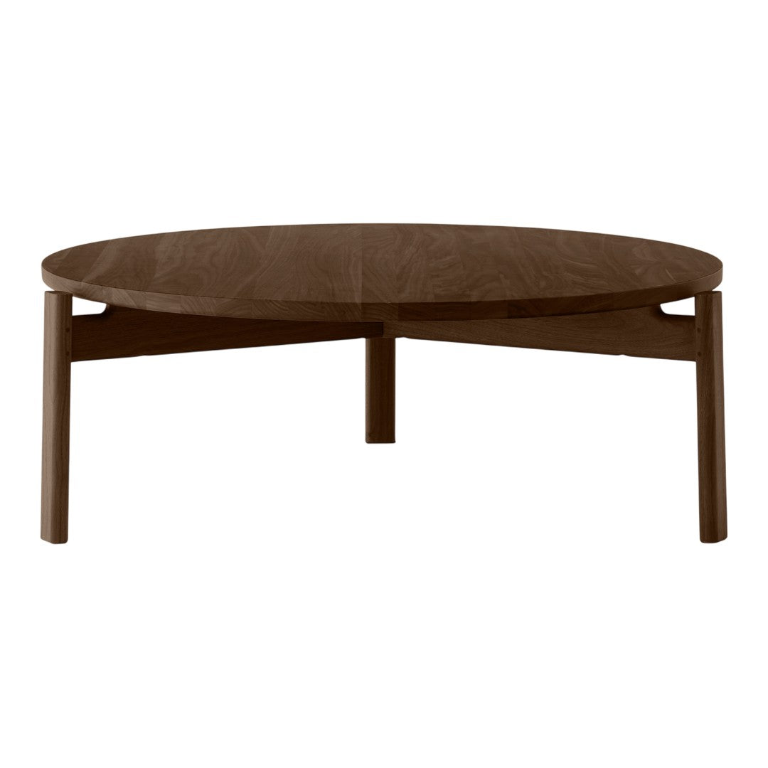 Round wooden coffee table in a rich brown finish with smooth surface and minimalist design. Ideal for modern decor.