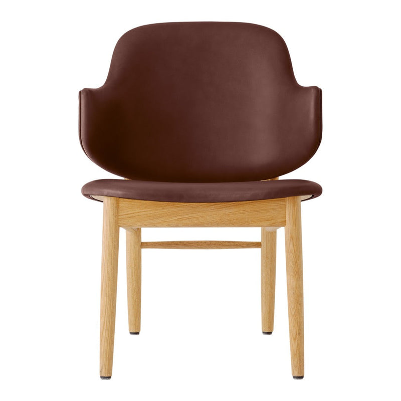 Brown leather dining chair with natural wood legs, featuring a sleek, minimalist design. Perfect for modern interiors.