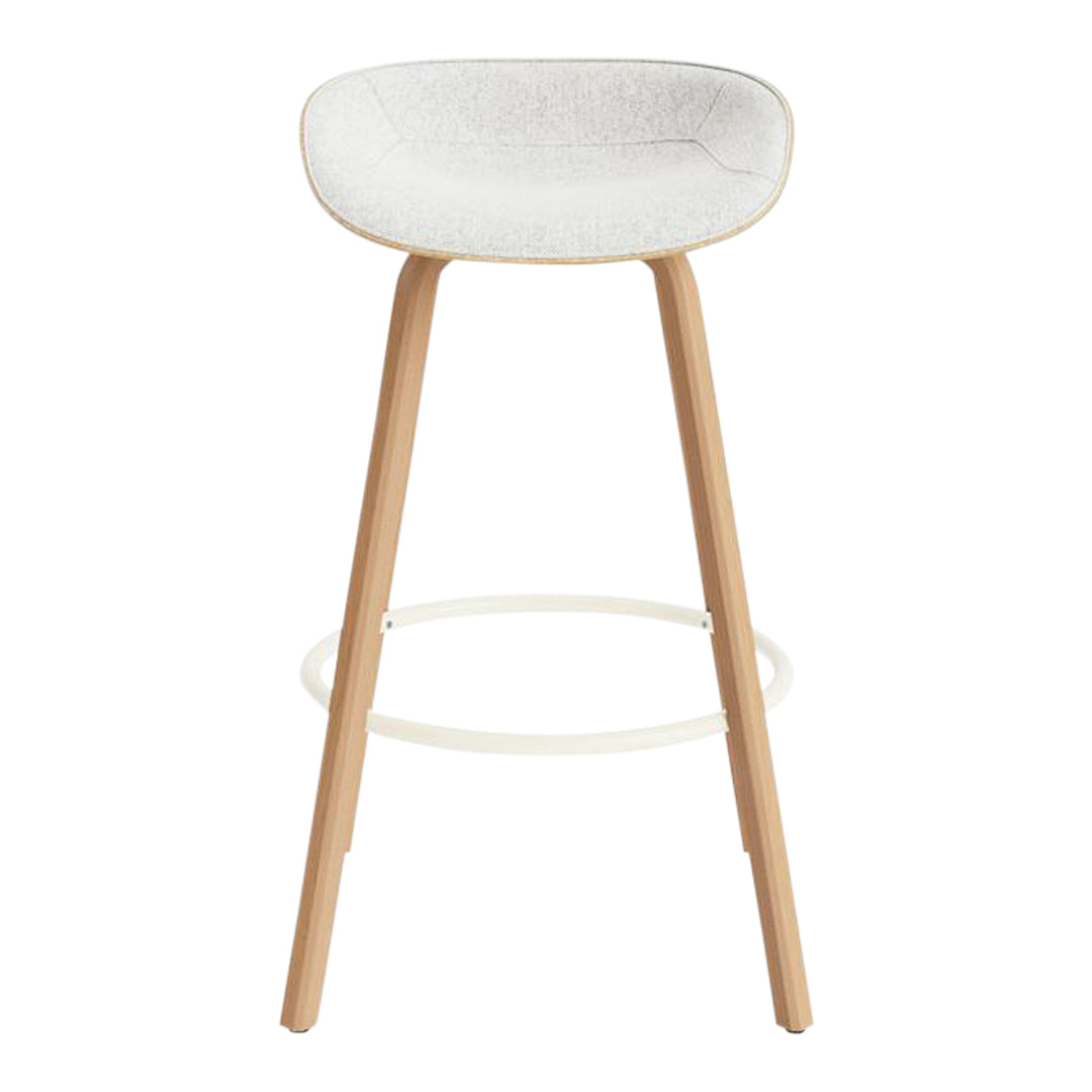 White cushioned stool with natural wood legs and a minimalist design. Ideal for modern interiors.