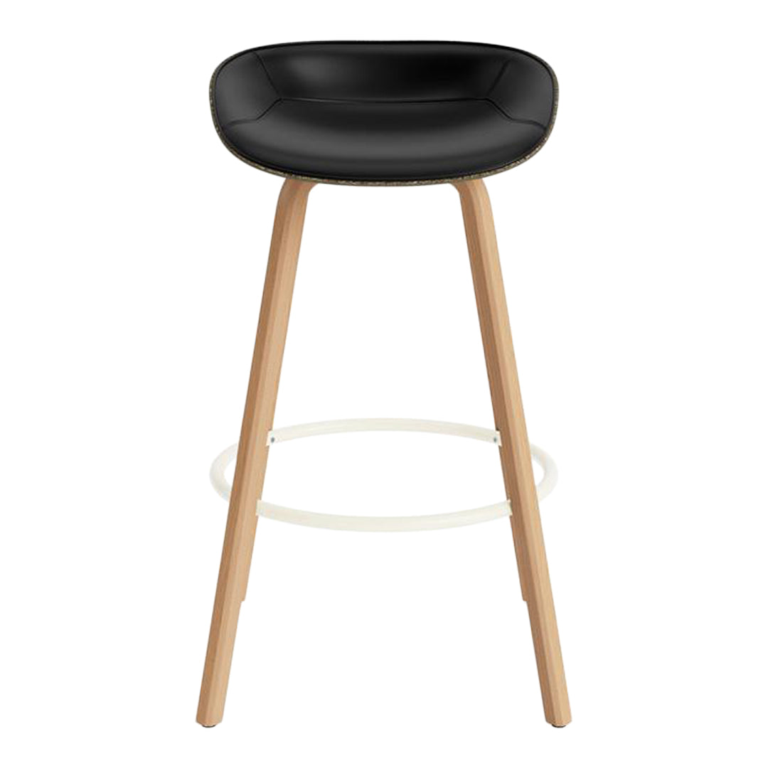 Black bar stool with a smooth seat and natural wood legs, featuring a minimalist design and clean lines.