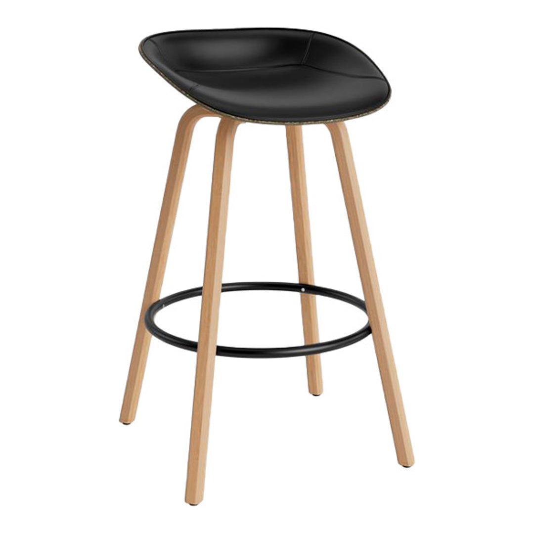 Black cushioned stool with light wood legs and a sleek design, featuring a minimalist style and simple curves.