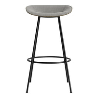Gray upholstered bar stool with a sleek black metal frame, featuring a minimalist design. Ideal for modern spaces.