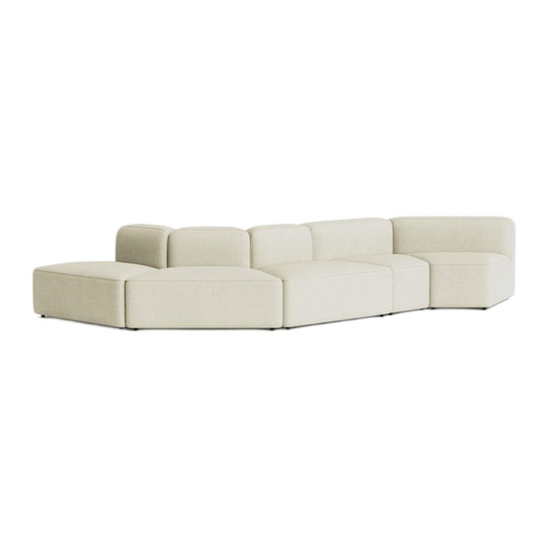 Modern sectional sofa in soft beige with a textured fabric and minimalist design, perfect for contemporary spaces.