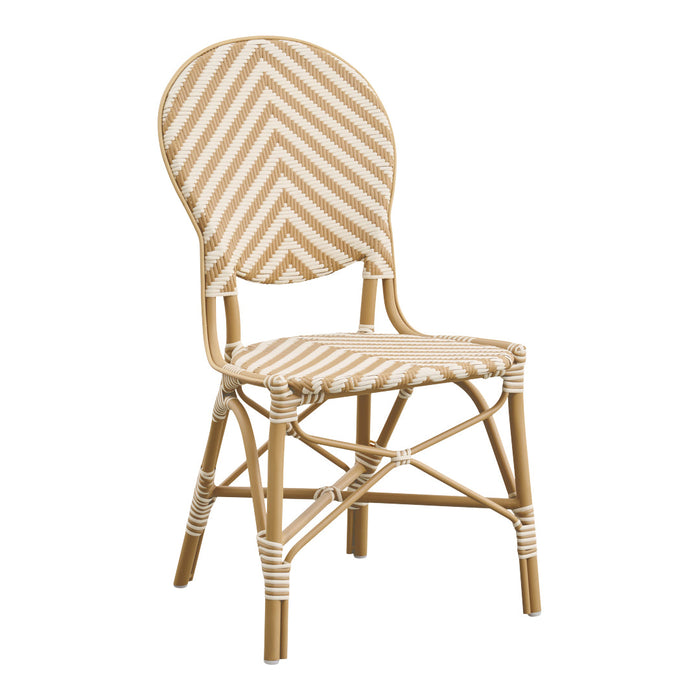 Beige and cream zigzag pattern dining chair with rounded back and rattan-style design.
