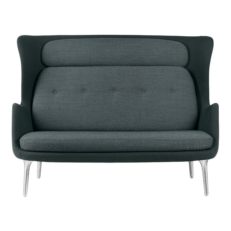 Gray upholstered loveseat with a smooth texture and subtle button detailing, featuring sleek metal legs.