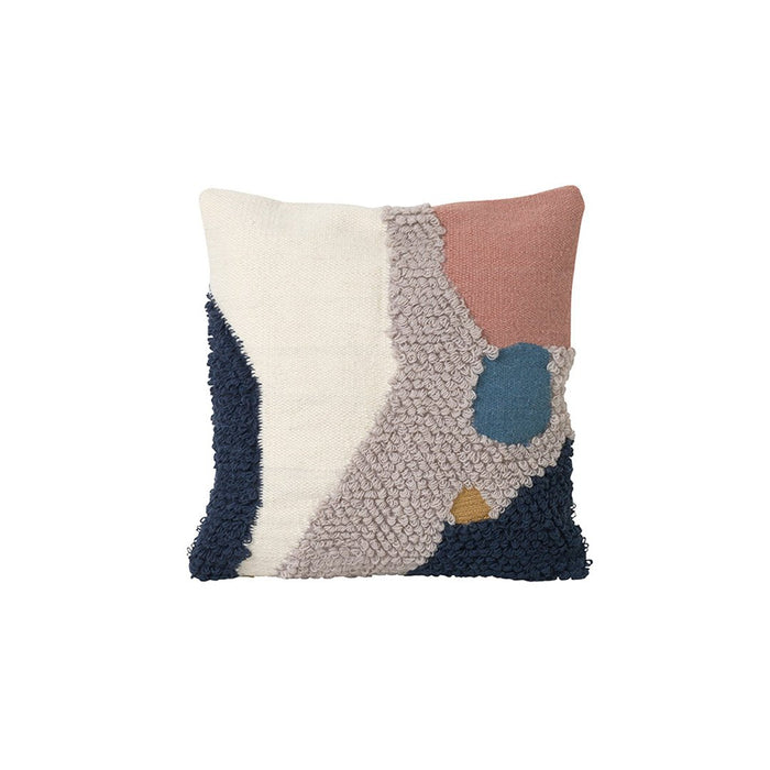 Multicolored decorative pillow featuring navy, pink, cream, and blue abstract patterns. Perfect for modern decor.