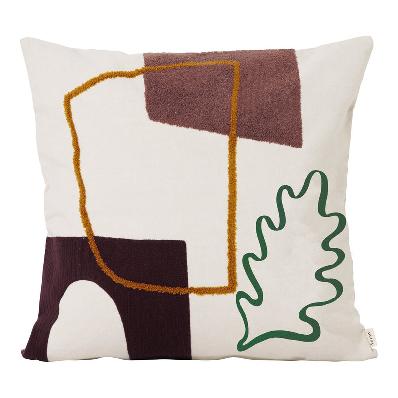 Abstract decorative pillow featuring earthy tones, geometric shapes, and a green leaf pattern on a cream background.