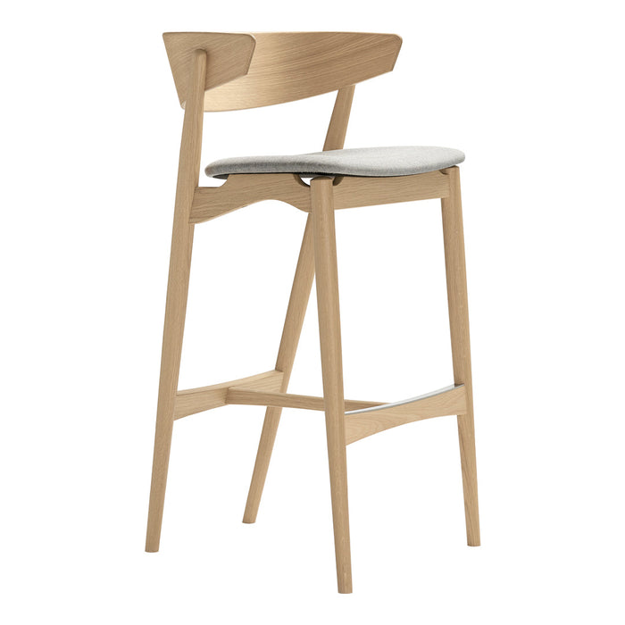 Light wood barstool with a minimalist design and a soft white cushion, showcasing natural tones and smooth lines.