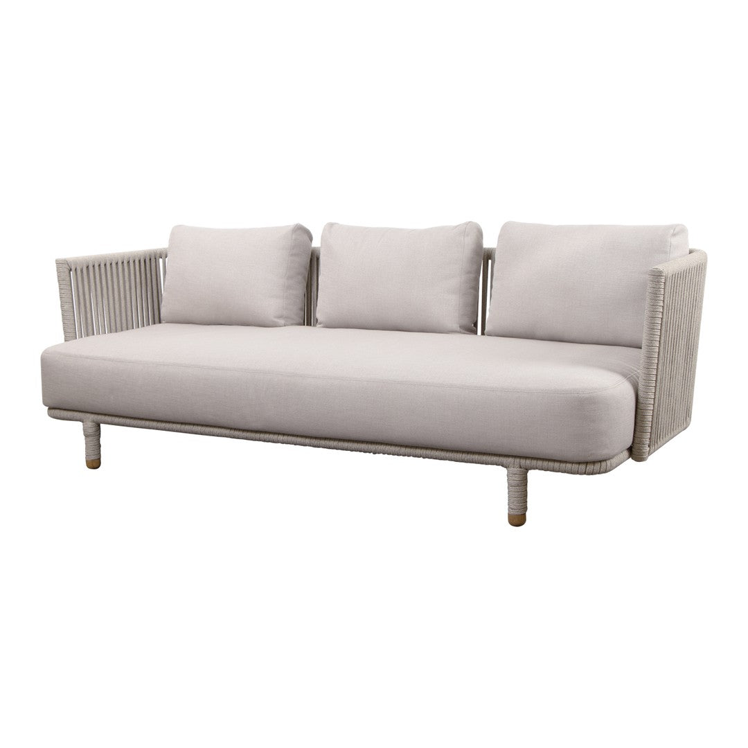 Light gray sofa with white cushions and a textured, woven arm design. Modern and minimalist aesthetic.