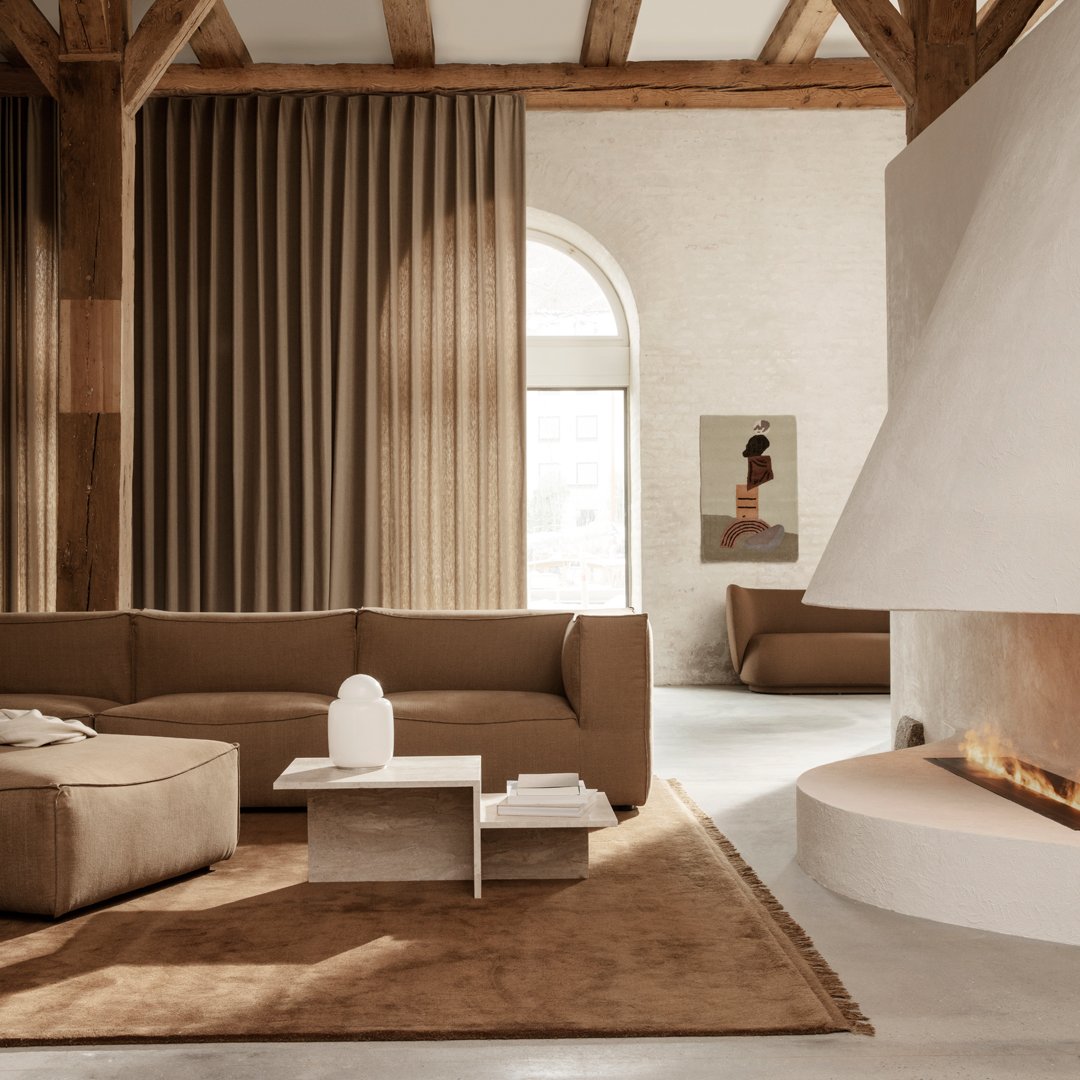 Warm beige and earthy brown tones with soft textures and sleek lines for a cozy, modern living space.