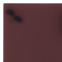 Deep burgundy surface with matte finish, accented by two black circular knobs.