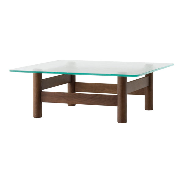 Wooden coffee table with dark brown legs and a clear glass top, featuring a sleek, minimalist design.