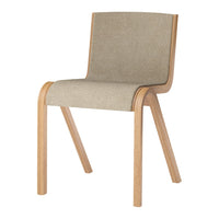 Minimalist chair featuring a beige textured seat and natural wood frame. Perfect for modern decor.