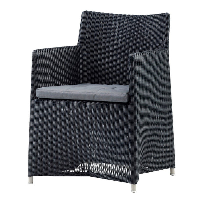 Black woven chair with a textured pattern and a gray cushion, ideal for outdoor or modern decor.