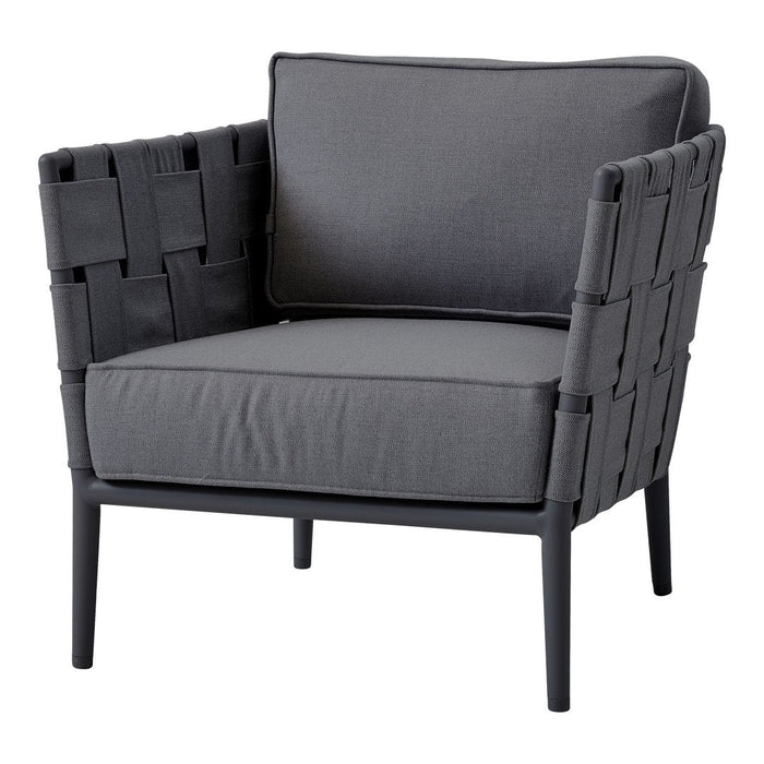 Gray woven fabric armchair with a sleek, minimalist design and plush cushion, perfect for modern decor.