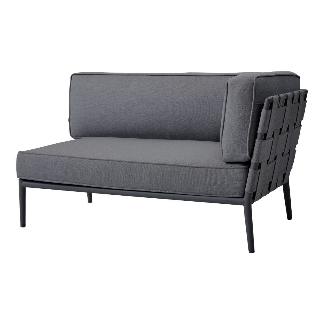 Gray two-seater sofa with a sleek woven pattern and minimalist black metal frame. Elegant and modern design.