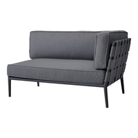 Gray two-seater sofa with a sleek woven pattern and minimalist black metal frame. Elegant and modern design.